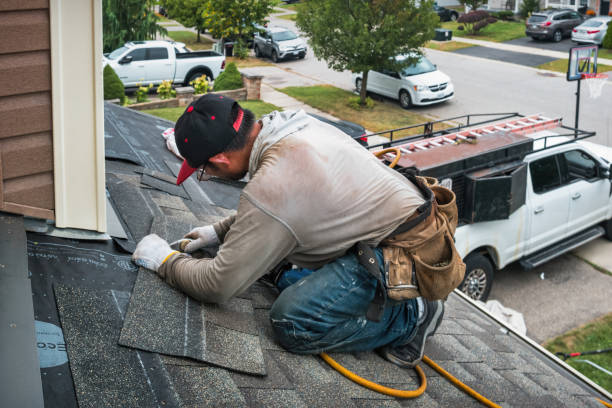 Professional Roof Replacement technician working in Kingsley, MI